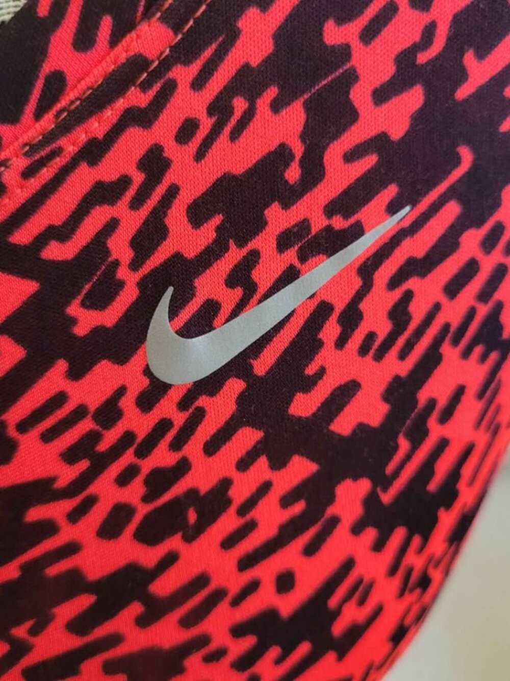 Nike Dri-Fit Racerback Running Tank Top In A Coral And Black Abstract Pattern - Picture 5 of 8
